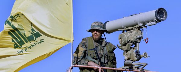 Hezbollah fighter stands at a watchtower (File) Hezbollah fighter stands at a watchtower (File) - Sputnik International
