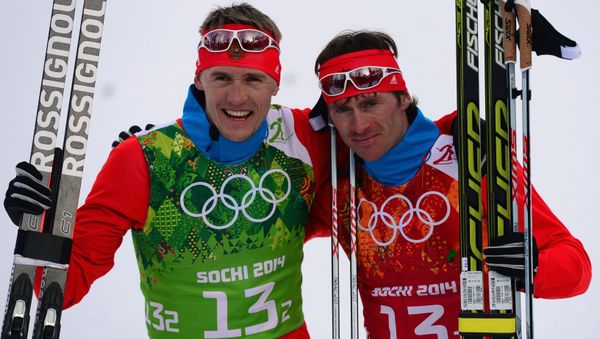 From left: Nikita Kryukov (Russia) and Maxim Vylegzhanin (Russia) at the finish of the final round of the team sprint in men’s cross-country skiing at the XXII Olympic Winter Games in Sochi From left: Nikita Kryukov (Russia) and Maxim Vylegzhanin (Russia) at the finish of the final round of the team sprint in men’s cross-country skiing at the XXII Olympic Winter Games in Sochi - Sputnik International