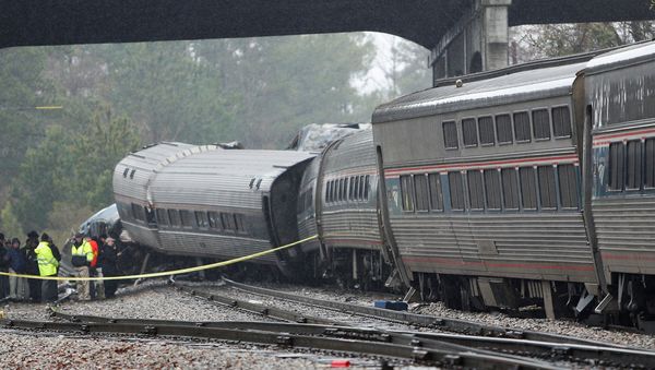 Emergency responders are at the scene after an Amtrak passenger train collided with a freight train and derailed in Cayce, South Carolina, U.S., February 4, 2018. - Sputnik International