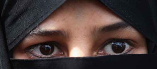 A veiled Iranian woman wearing hijab A veiled Iranian woman wearing hijab - Sputnik International