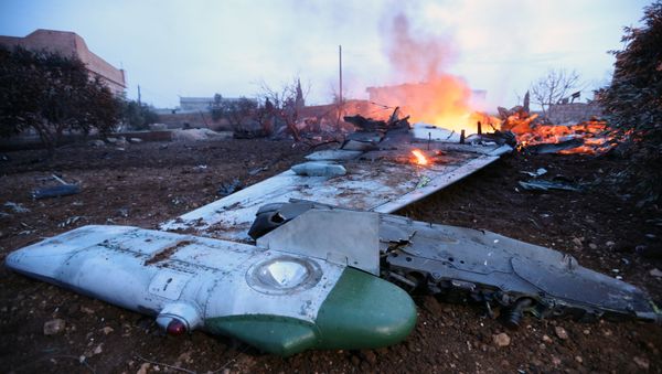 A picture taken on February 3, 2018, shows smoke billowing from the site of a downed Sukhoi-25 fighter jet in Syria's northwest province of Idlib A picture taken on February 3, 2018, shows smoke billowing from the site of a downed Sukhoi-25 fighter jet in Syria's northwest province of Idlib - Sputnik International