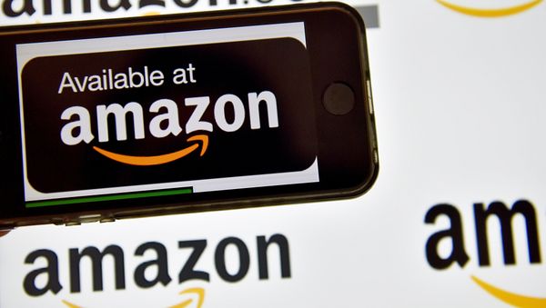 This file photo taken on December 28, 2016 shows the logo of US electronic commerce and cloud computing company Amazon in Vertou, France This file photo taken on December 28, 2016 shows the logo of US electronic commerce and cloud computing company Amazon in Vertou, France - Sputnik International