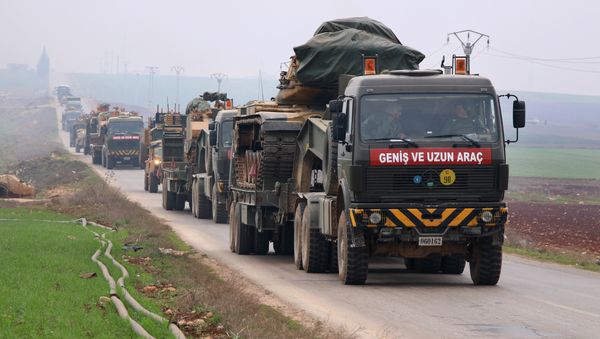 A Turkish military convoy passes through Kafr Halab in the south of Aleppo province on February 5, 2018 - Sputnik International