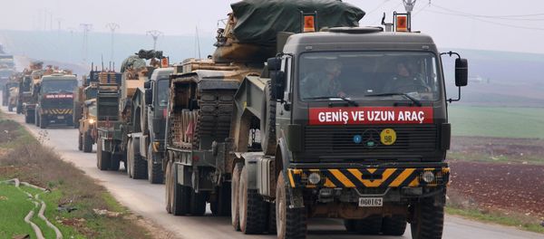 A Turkish military convoy passes through Kafr Halab in the south of Aleppo province on February 5, 2018 - Sputnik International