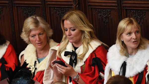 Baroness Michelle Mone (C) waits for the start of the State Opening of Parliament in the Houses of Parliament in London on June 21, 2017 - Sputnik International