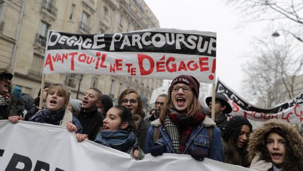 High school students hold banners during a demonstration against a French government proposed reform of university applications and a project to reform the French baccalaureate high school exit exam, on February 6, 2018, in Paris - Sputnik International