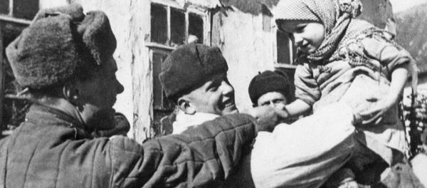 Red Army soldiers and residents of village they liberated during the 1941-1945 Great Patriotic War Red Army soldiers and residents of village they liberated during the 1941-1945 Great Patriotic War - Sputnik International
