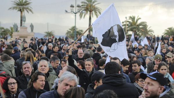 Residents of the Corsica island take the streets in Ajaccio, France, as they demonstrate ahead of a visit to the Mediterranean island next week by French President Emmanuel Macron, Saturday, Feb. 3, 2018 - Sputnik International