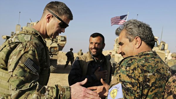 U.S. Army Maj. Gen. Jamie Jarrard left, thanks Manbij Military Council commander Muhammed Abu Adeel during a visit to a small outpost near the town of Manbij, northern Syria, Wednesday, Feb. 7, 2018 U.S. Army Maj. Gen. Jamie Jarrard left, thanks Manbij Military Council commander Muhammed Abu Adeel during a visit to a small outpost near the town of Manbij, northern Syria, Wednesday, Feb. 7, 2018 - Sputnik International