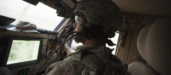 In Dec. 16, 2011 photo, Sergeant Daniel Martin watches the road and a GPS device inside his unit's Mine Resistant Ambush Protected vehicle during the US military's last combat patrol in Iraq In Dec. 16, 2011 photo, Sergeant Daniel Martin watches the road and a GPS device inside his unit's Mine Resistant Ambush Protected vehicle during the US military's last combat patrol in Iraq - Sputnik International