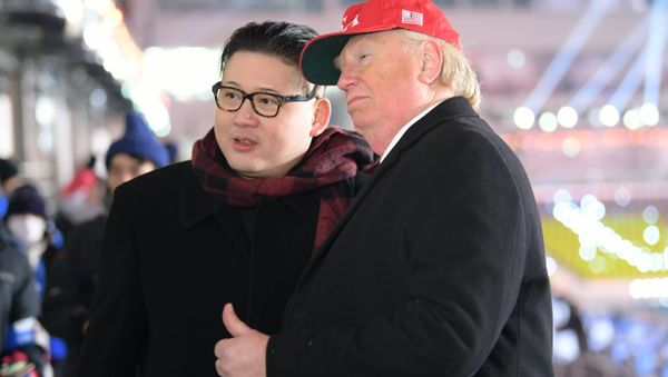 A man impersonating US President Donald Trump (R) and another impersonating Kim Jong-un pose in the stands during the opening ceremony of the Pyeongchang 2018 Winter Olympic Games at the Pyeongchang Stadium - Sputnik International