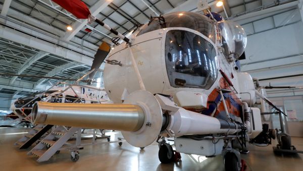 A MAC Ka-32A with precision fire extinguishing system attached. - Sputnik International