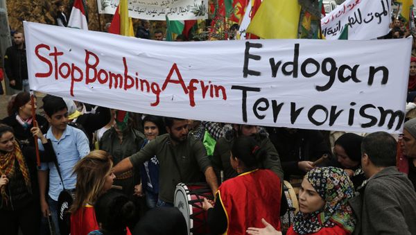 In this Friday, Jan. 26, 2018 file photo, Kurdish demonstrators, protest against the operation by the Turkish army aimed at ousting the U.S.-backed Kurdish militia from the area in Afrin, Syria, in Rabiyeh, east of Beirut, Lebanon. Syria’s Kurdish militia is growing frustrated with its patron, the United States, and is pressing it to do more to stop Turkey’s assault on Afrin. Their complaints reflect the differing agendas. The Kurds want to ensure their self-rule, while the U.S. wants them to focus on governing the territory they wrested from IS militants. - Sputnik International