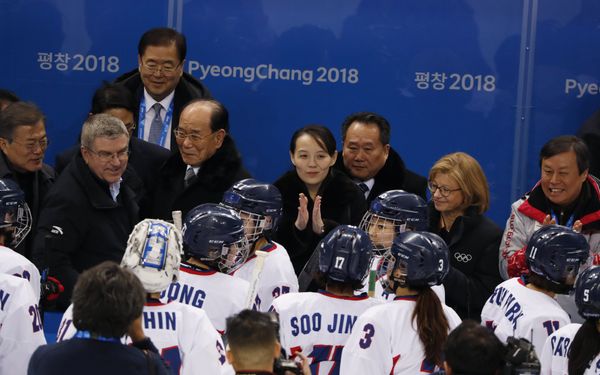 Ice Hockey – Pyeongchang 2018 Winter Olympics – Women Preliminary Round Match - Switzerland v Korea - Kwandong Hockey Centre, Gangneung, South Korea – February 10, 2018 - Kim Yo Jong claps next to Kim Yong Nam - Sputnik International
