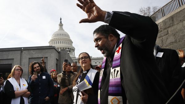 Rev. William Barber II, with the Poor People's Campaign, speaks to the group after they prayed inside of the Capitol Rotunda in protest of the GOP tax overhaul, Monday, Dec. 4, 2017, on Capitol Hill in Washington. - Sputnik International