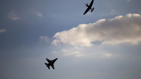An Israeli Air Force F-16 plane, bottom, and an Israeli Air force Spitfire plane perform during a graduation ceremony for new pilots in the Hatzerim air force base near the city of Beersheba, Israel. (File) An Israeli Air Force F-16 plane, bottom, and an Israeli Air force Spitfire plane perform during a graduation ceremony for new pilots in the Hatzerim air force base near the city of Beersheba, Israel. (File) - Sputnik International