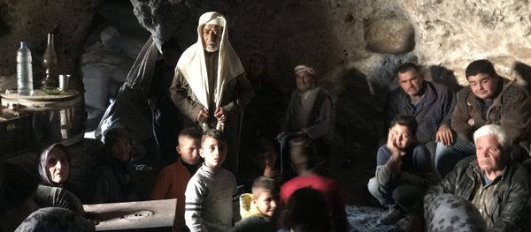 Residents of the Kurdish township of Jenderes in Afrin region in the north of Syria who fled from shellings by the Turkish Army are hiding in the caves in Haltan village - Sputnik International