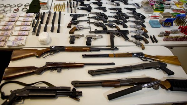 Weapons that were seized during an anti-drug raid, are displayed on a table for a media presentation in Buenos Aires, Argentina, Friday, May 16, 2014 Weapons that were seized during an anti-drug raid, are displayed on a table for a media presentation in Buenos Aires, Argentina, Friday, May 16, 2014 - Sputnik International