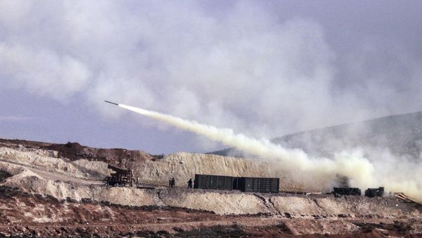 Turkish artillery fires toward Syrian Kurdish positions in Afrin area, Syria, from Turkish side of the border in Hatay, Turkey, Friday, Feb. 9, 2018 Turkish artillery fires toward Syrian Kurdish positions in Afrin area, Syria, from Turkish side of the border in Hatay, Turkey, Friday, Feb. 9, 2018 - Sputnik International