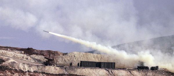 Turkish artillery fires toward Syrian Kurdish positions in Afrin area, Syria, from Turkish side of the border in Hatay, Turkey, Friday, Feb. 9, 2018 Turkish artillery fires toward Syrian Kurdish positions in Afrin area, Syria, from Turkish side of the border in Hatay, Turkey, Friday, Feb. 9, 2018 - Sputnik International