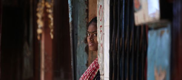 An Indian sex worker looks on outside her house at the Kamathipura red-light district, in Mumbai, India, Monday (File) An Indian sex worker looks on outside her house at the Kamathipura red-light district, in Mumbai, India, Monday (File) - Sputnik International