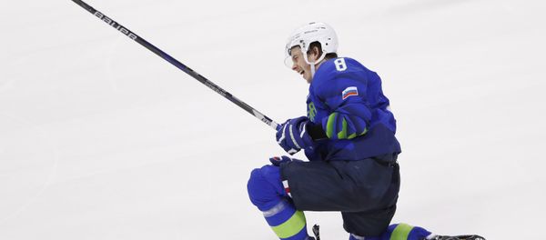 Ice Hockey - Pyeongchang 2018 Winter Olympics - Men's Preliminary Round Match - Slovenia v Slovakia - Kwandong Hockey Centre, Gangneung, South Korea - February 17, 2018 - Ziga Jeglic of Slovenia celebrates after scoring the winning goal in a penalty shoot-out against Slovakia. Ice Hockey - Pyeongchang 2018 Winter Olympics - Men's Preliminary Round Match - Slovenia v Slovakia - Kwandong Hockey Centre, Gangneung, South Korea - February 17, 2018 - Ziga Jeglic of Slovenia celebrates after scoring the winning goal in a penalty shoot-out against Slovakia. - Sputnik International