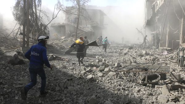 Members of the Syrian Civil Defense run to help survivors from a street that attacked by airstrikes and shelling of the Syrian government forces, in Ghouta, suburb of Damascus, Syria - Sputnik International