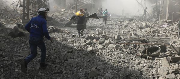 Members of the Syrian Civil Defense run to help survivors from a street that attacked by airstrikes and shelling of the Syrian government forces, in Ghouta, suburb of Damascus, Syria Members of the Syrian Civil Defense run to help survivors from a street that attacked by airstrikes and shelling of the Syrian government forces, in Ghouta, suburb of Damascus, Syria - Sputnik International