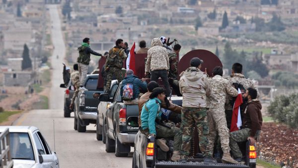 A picture taken on February 20, 2018 shows a convoy of pro-Syrian government fighters arriving in Syria's northern region of Afrin A picture taken on February 20, 2018 shows a convoy of pro-Syrian government fighters arriving in Syria's northern region of Afrin - Sputnik International
