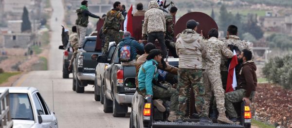 A picture taken on February 20, 2018 shows a convoy of pro-Syrian government fighters arriving in Syria's northern region of Afrin - Sputnik International