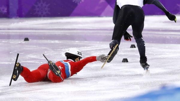 Short Track Speed Skating Events - Pyeongchang 2018 Winter Olympics - Men's 500 m Competition - Gangneung Ice Arena - Gangneung, South Korea - February 20, 2018. Keita Watanabe of Japan in action as Jong Kwang Bom of North Korea falls - Sputnik International