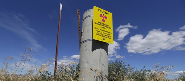 In this photo taken July 11, 2016, a sign warns of radioactive material stored underground on the Hanford Nuclear Reservation near Richland, Wash. In this photo taken July 11, 2016, a sign warns of radioactive material stored underground on the Hanford Nuclear Reservation near Richland, Wash. - Sputnik International