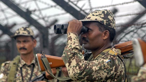 (File) Indian Border Security Force soldiers patrol at Champakgachh village, on the India-Bangladesh border, about 12 kilometers (7 miles) from Siliguri, India, Tuesday, Sept. 6, 2011 (File) Indian Border Security Force soldiers patrol at Champakgachh village, on the India-Bangladesh border, about 12 kilometers (7 miles) from Siliguri, India, Tuesday, Sept. 6, 2011 - Sputnik International