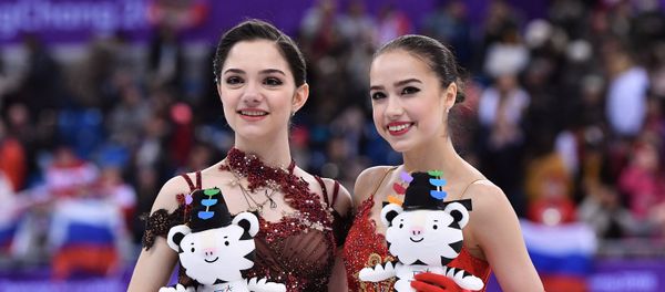 Russian medalists in women's figure skating at the XXIII Winter Olympic Games, from left: silver medalist Evgenia Medvedeva and gold medalist Alina Zagitova Russian medalists in women's figure skating at the XXIII Winter Olympic Games, from left: silver medalist Evgenia Medvedeva and gold medalist Alina Zagitova - Sputnik International