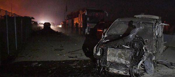 Vehicles from a convoy sit destroyed at the crossing of Al-Ziara in the region of Afrin northern Syria on February 22, 2018 - Sputnik International