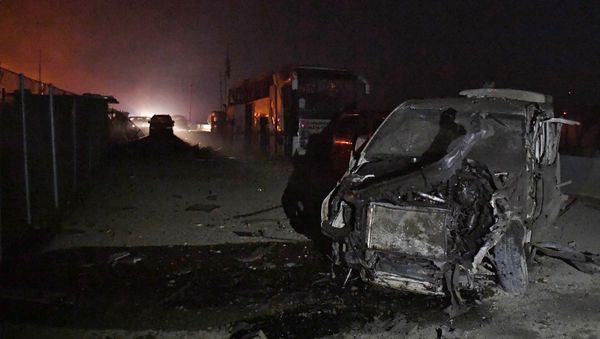 Vehicles from a convoy sit destroyed at the crossing of Al-Ziara in the region of Afrin northern Syria on February 22, 2018 - Sputnik International