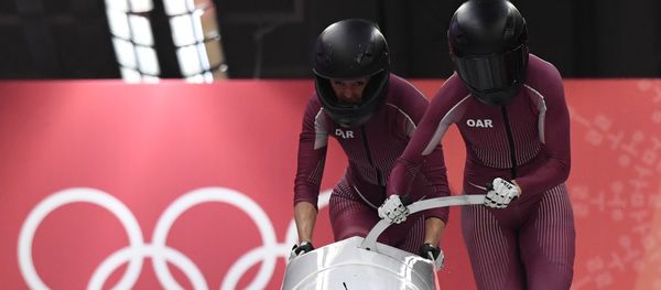 Russia's Nadezhda Sergeeva (R) and Russia's Anastasia Kocherzhova compete in the women's bobsleigh heat 1 run during the Pyeongchang 2018 Winter Olympic Games, at the Olympic Sliding Centre on February 20, 2018 in Pyeongchang - Sputnik International
