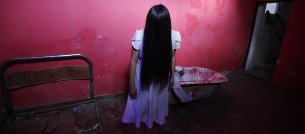 Lineth Mollo portrays Samara Morgan, the central character of 'The Ring' horror film, poses before performing at a House of Terror during a Halloween night in El Alto, Bolivia, Wednesday, Oct. 30, 2013 Lineth Mollo portrays Samara Morgan, the central character of 'The Ring' horror film, poses before performing at a House of Terror during a Halloween night in El Alto, Bolivia, Wednesday, Oct. 30, 2013 - Sputnik International