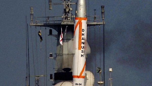 The home-developed Dhanush, or Bow missile, takes off from a navy warship in the Bay of Bengal off the coast of eastern Orissa state, India, Friday, March 11, 2011 - Sputnik International