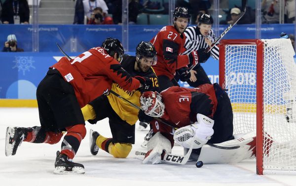Ice Hockey - Pyeongchang 2018 Winter Olympics - Men Semifinal Match - Canada v Germany - Gangneung Hockey Centre, Gangneung, South Korea - February 23, 2018 - Yasin Ehliz of Germany fails in his attempt to score against goalie Kevin Poulin of Canada Ice Hockey - Pyeongchang 2018 Winter Olympics - Men Semifinal Match - Canada v Germany - Gangneung Hockey Centre, Gangneung, South Korea - February 23, 2018 - Yasin Ehliz of Germany fails in his attempt to score against goalie Kevin Poulin of Canada - Sputnik International