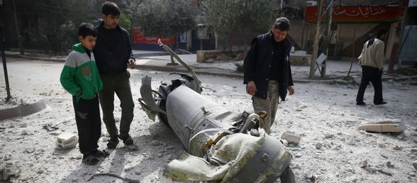 People inspect missile remains in the besieged town of Douma, in eastern Ghouta, in Damascus, Syria, February 23, 2018 People inspect missile remains in the besieged town of Douma, in eastern Ghouta, in Damascus, Syria, February 23, 2018 - Sputnik International