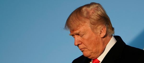US President Donald Trump steps off Air Force One upon return to Andrews Air Force in Maryland on January 18, 2018 - Sputnik International
