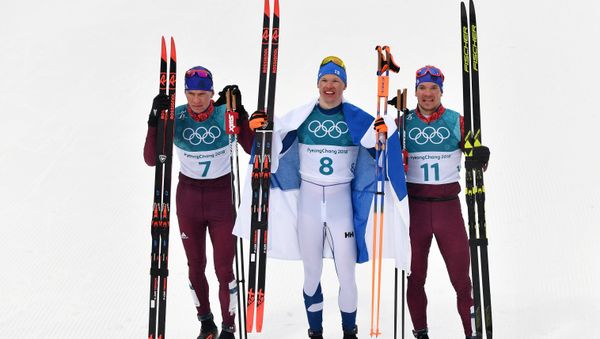 Medalists in the 50-km mass start race in men’s cross-country skiing at the XXIII Olympic Winter Games in Pyeongchang, from left: Alexander Bolshunov (Russia) - silver medal; Iivo Niskanen (Finland) - gold medal; and Andrei Larkov (Russia) - bronze medal Medalists in the 50-km mass start race in men’s cross-country skiing at the XXIII Olympic Winter Games in Pyeongchang, from left: Alexander Bolshunov (Russia) - silver medal; Iivo Niskanen (Finland) - gold medal; and Andrei Larkov (Russia) - bronze medal - Sputnik International