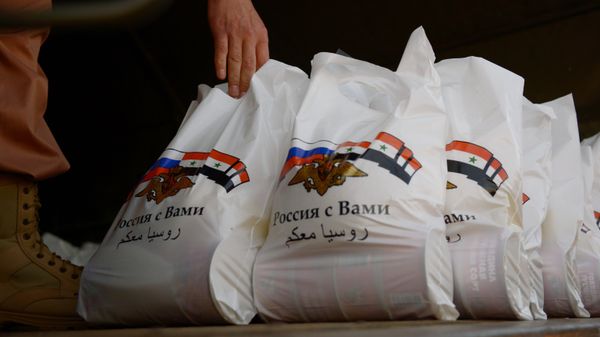 Syrian residents get Russian humanitarian relief aid - Sputnik International