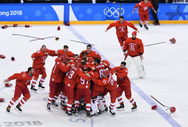 Russian ice hockey players celebrating their victory in the final match between Russia and Germany in the men's ice hockey tournament at the 2018 Winter Olympics - Sputnik International
