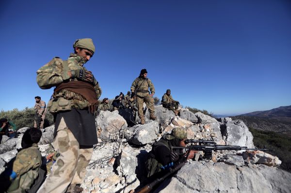 Turkish-backed Free Syrian Army fighters are seen near the city of Afrin, Syria February 19, 2018 Turkish-backed Free Syrian Army fighters are seen near the city of Afrin, Syria February 19, 2018 - Sputnik International