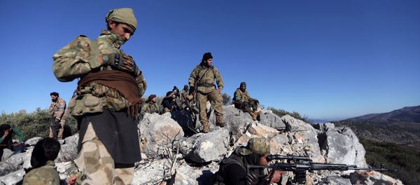 Turkish-backed Free Syrian Army fighters are seen near the city of Afrin, Syria February 19, 2018 Turkish-backed Free Syrian Army fighters are seen near the city of Afrin, Syria February 19, 2018 - Sputnik International