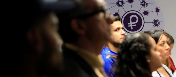 The new Venezuelan cryptocurrency Petro logo is seen at a facility of the Youth and Sports Ministry in Caracas, Venezuela February 23, 2018 - Sputnik International