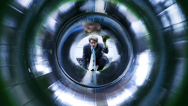 A man looks into a tube representing a natural gas pipeline at the booth of Nord Stream at the Hanover industrial fair in Hanover, Germany (File) A man looks into a tube representing a natural gas pipeline at the booth of Nord Stream at the Hanover industrial fair in Hanover, Germany (File) - Sputnik International