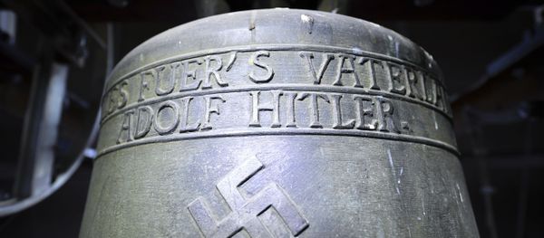 Church bell with the inscription Everything for the fatherland Adolf Hitler and a swastika is pictured in the town church in Herxheim am Berg, western Germany. (File) Church bell with the inscription Everything for the fatherland Adolf Hitler and a swastika is pictured in the town church in Herxheim am Berg, western Germany. (File) - Sputnik International